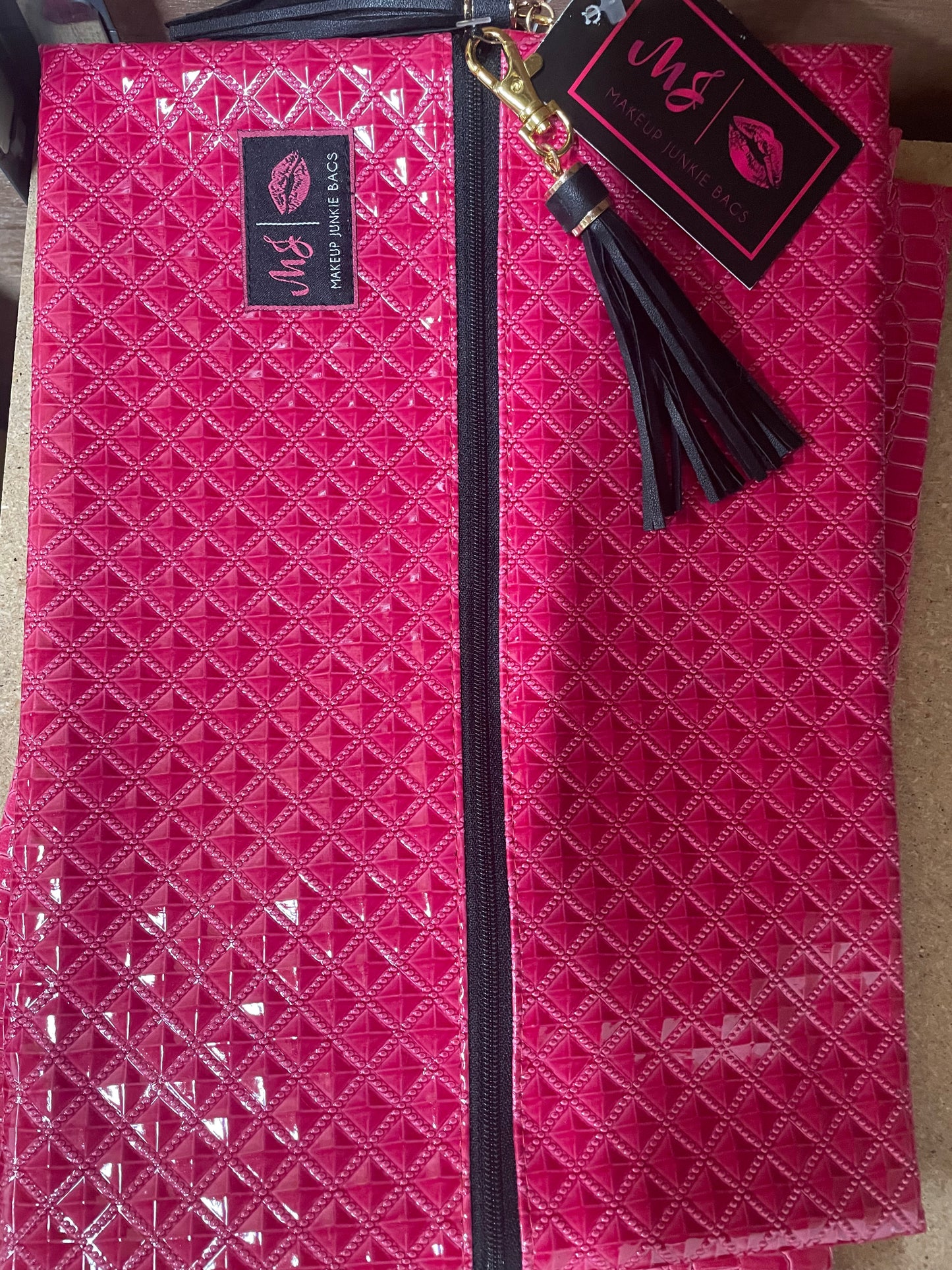 Tricia Wells- Large pink stud makeup junkie bag